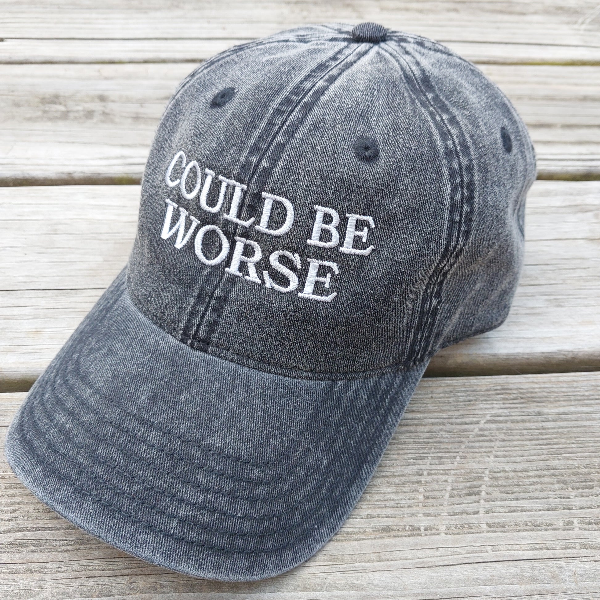 Could Be Worse embroidered on faded black vintage cotton twill hat, angle view