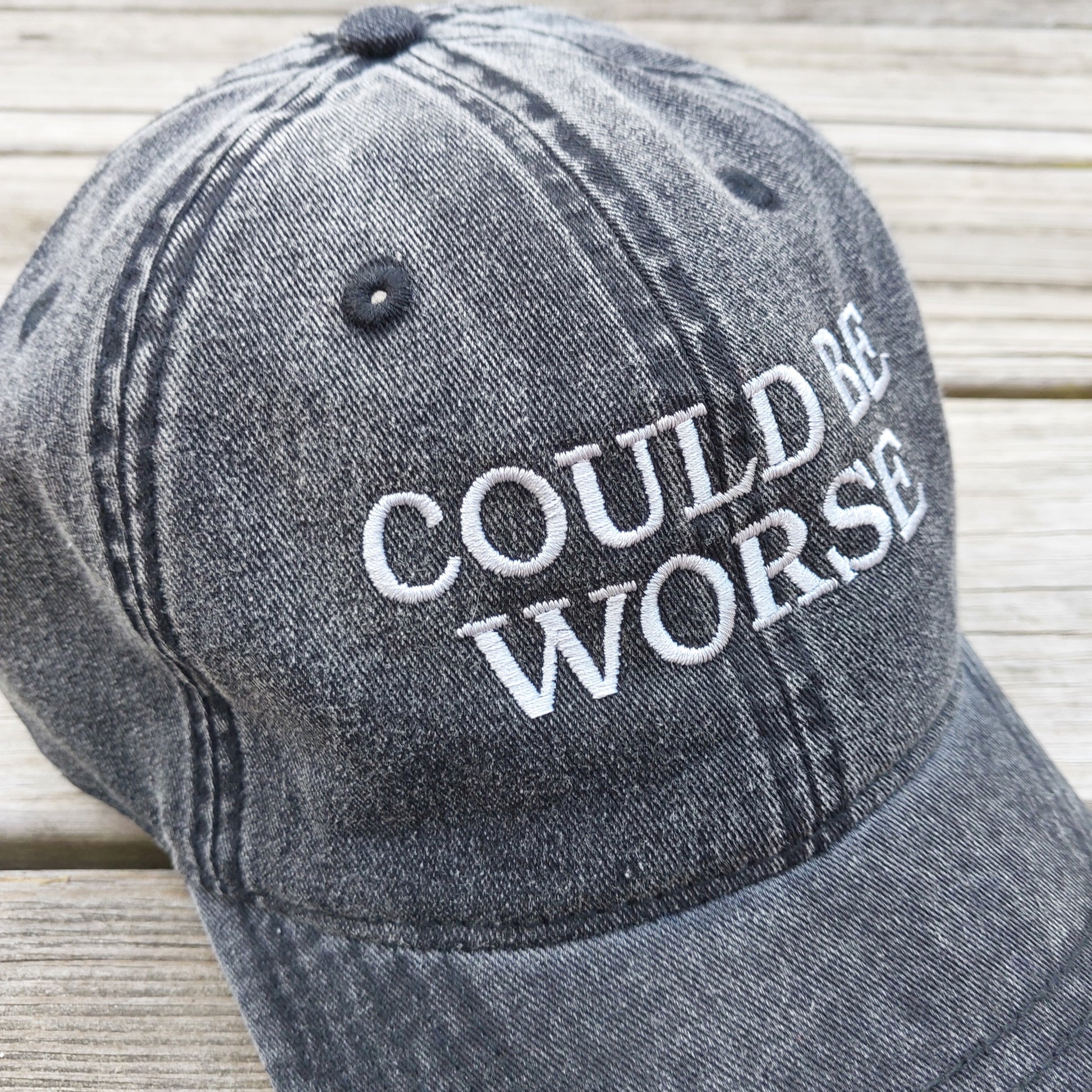 Could Be Worse embroidered on faded black vintage cotton twill hat, detail view